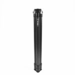 A black pole with some white letters on it