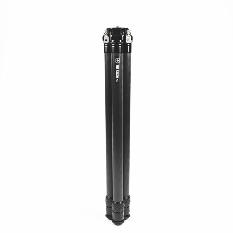 A black pole with some white letters on it