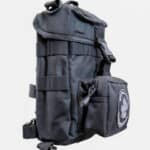 A backpack with many compartments and a large pocket.