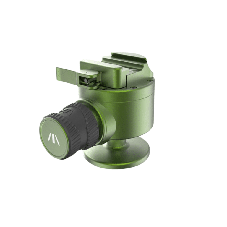 A green camera with a black cap and tripod