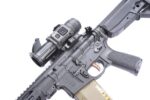 A close up of an ar-1 5 rifle with a scope