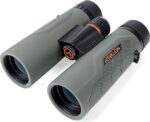 A pair of binoculars with an orange dot on the side.