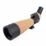A picture of an outdoor telescope with its lens open.