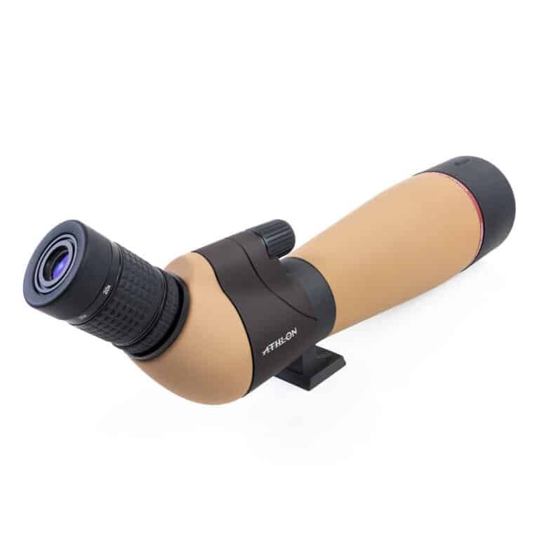A picture of an object with a black and brown handle.