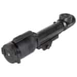 A black tube with a light on top of it.