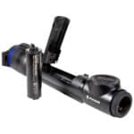 A camera with two batteries and a tripod.