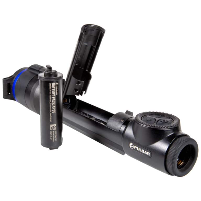 A camera with two batteries and a tripod.