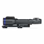 A rifle scope with blue ring on it.