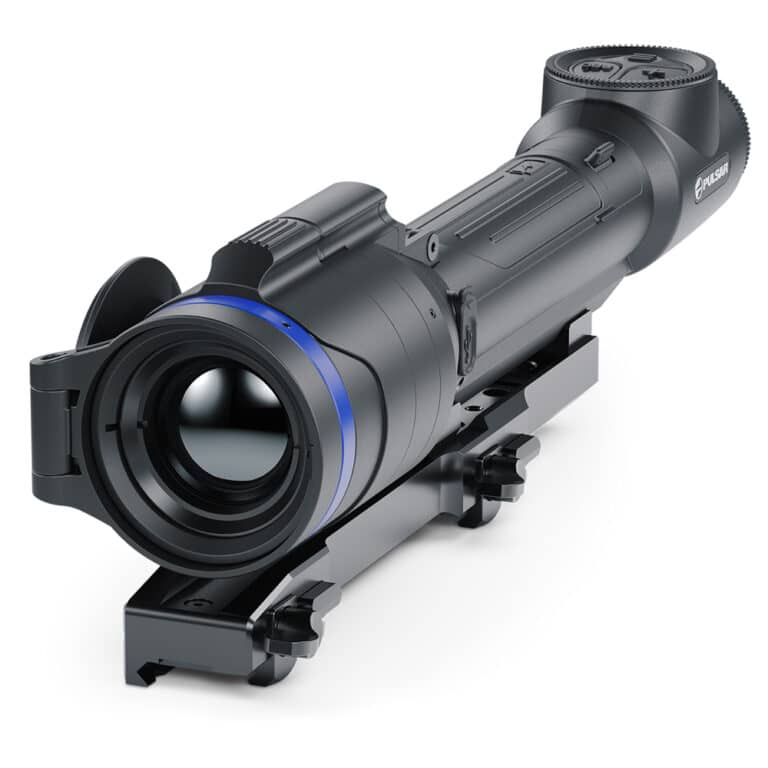 A rifle scope with blue ring on it.