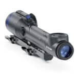 A night vision scope with an attached rail.