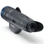 A camera with an attached lens and tripod.