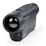 A camera that is on the ground and has a lens.