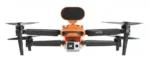 A camera attached to an orange and black device.