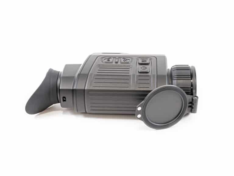 A small camera with a lens attached to it.