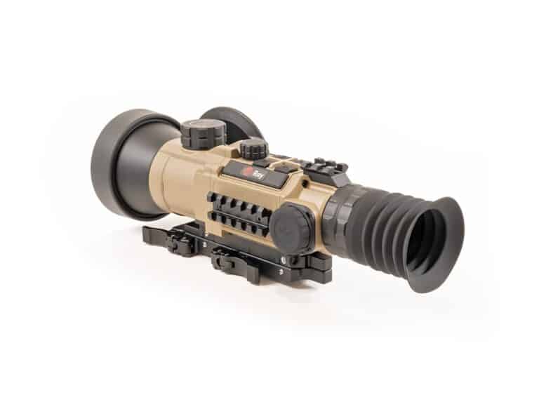 A rifle scope with an attached camera.