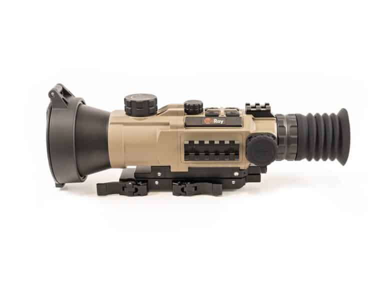 A rifle scope with an attached camera.