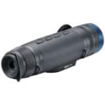 A night vision device is shown with the lens closed.