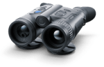 A pair of binoculars sitting on top of a table.