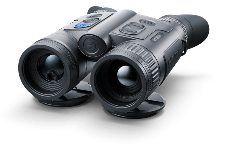 A pair of binoculars sitting on top of a table.