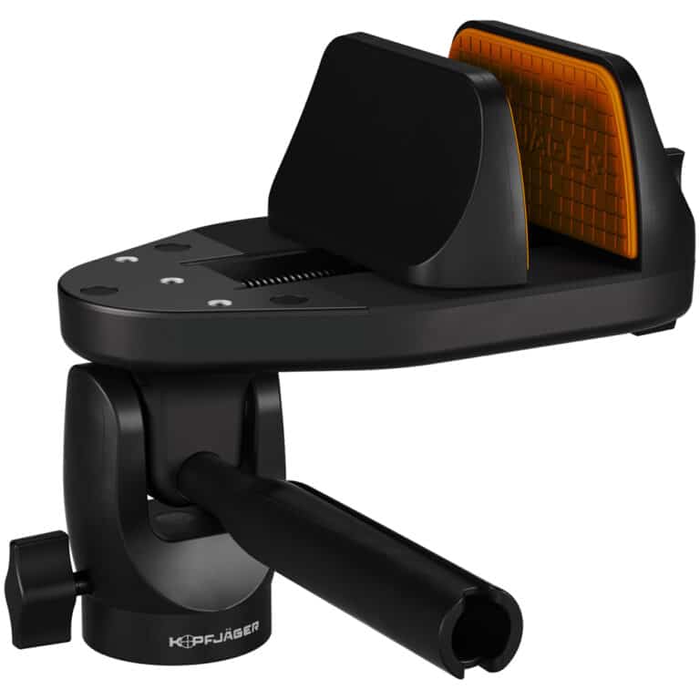 A black and orange phone holder attached to the side of a car.