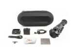 A camera with accessories and a case