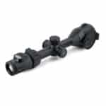A black scope with two magnifiers on top of it.