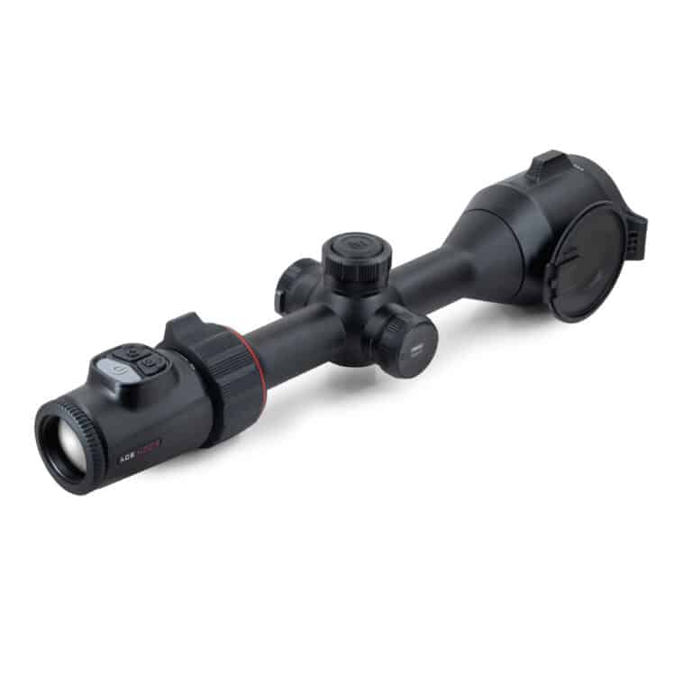 A black scope with two magnifiers on top of it.