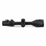 A black scope with red accents on top of it.