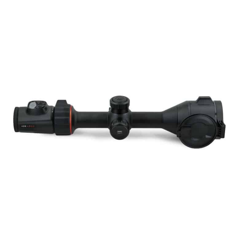 A rifle scope with a red dot sight on it.