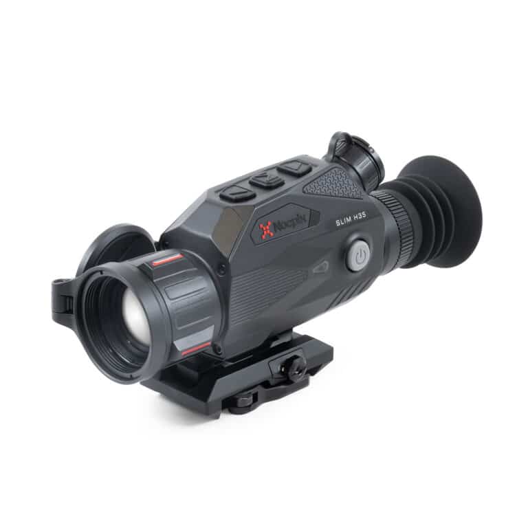 A black and silver camera with a red dot sight.