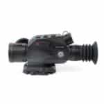 A black camera with a lens attached to it.