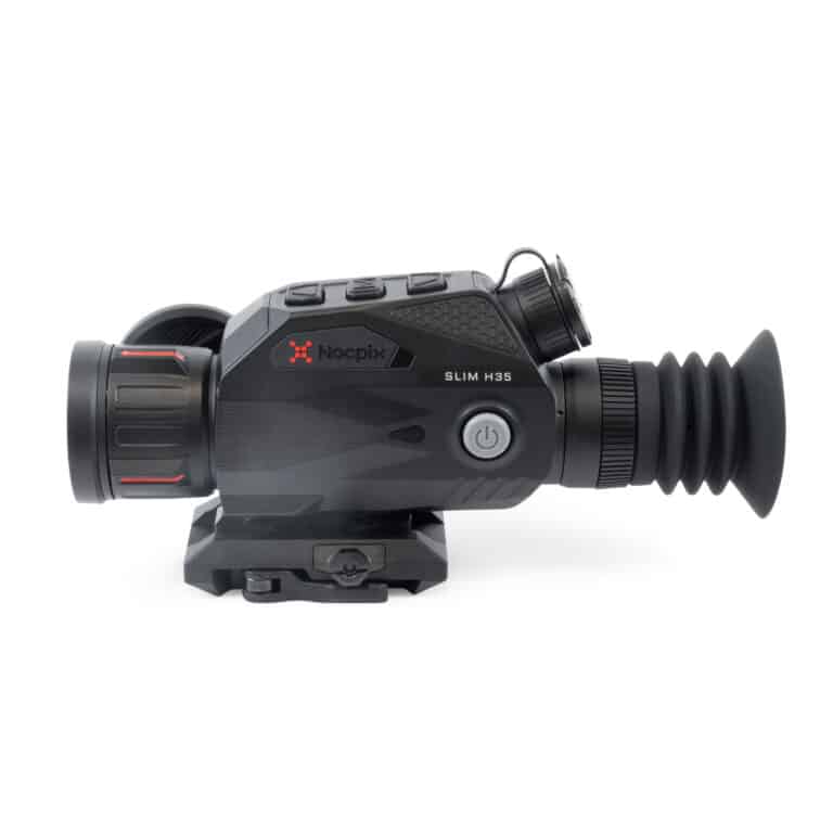 A black camera with a lens attached to it.