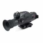 A night vision scope is shown with the sight on.