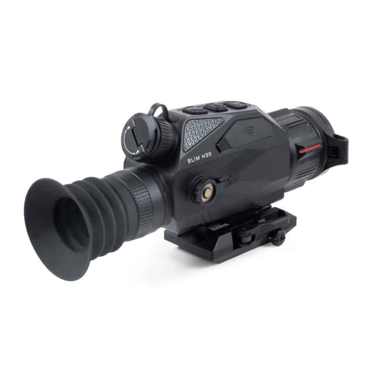 A night vision scope is shown with the sight on.