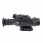 A black and red camera with a lens attached to it.