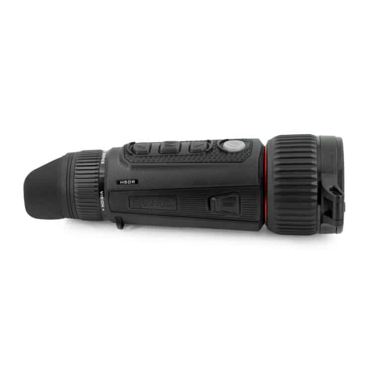 A black and red camera is on the side of a white background