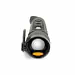 A black and yellow flashlight is on the floor.