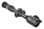 A close up of the scope on a rifle