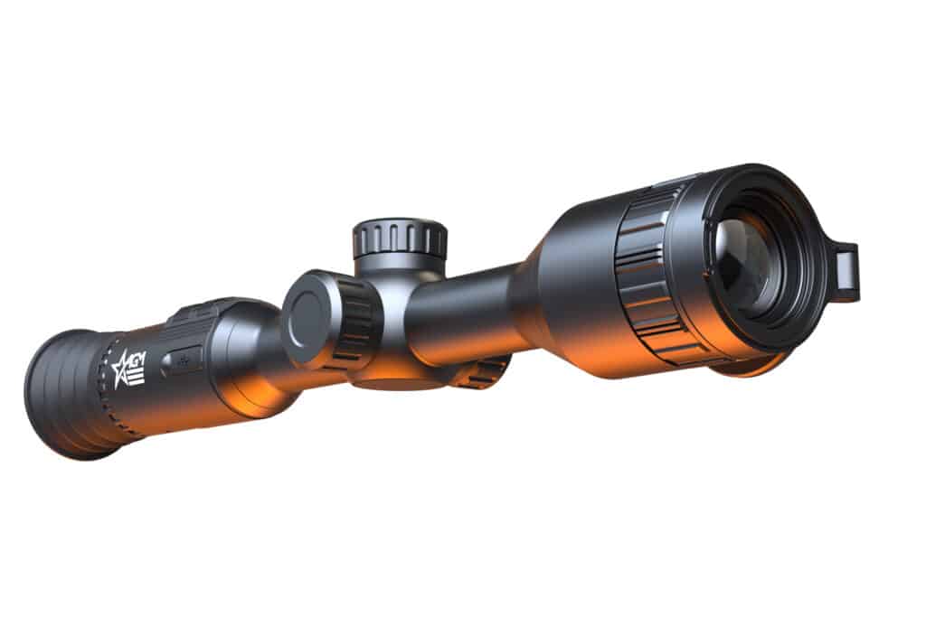 A close up of the scope on a rifle