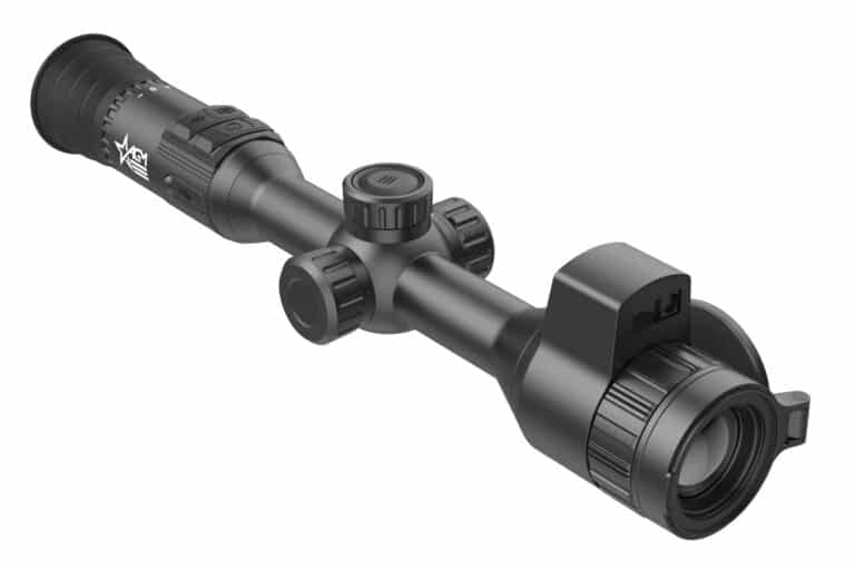A rifle scope with an attached sight and a light.
