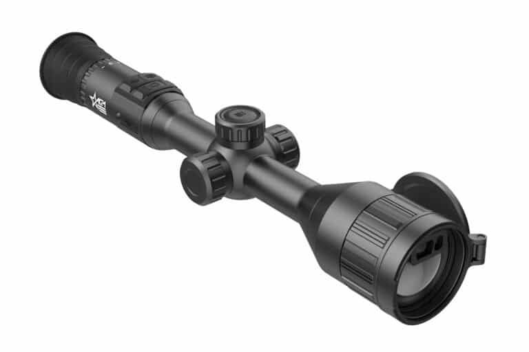 A black scope with a red dot sight on it.