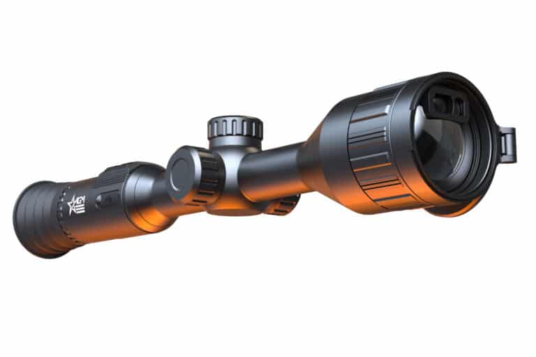 A close up of the scope on a rifle