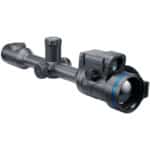 A rifle scope with blue ring on it.