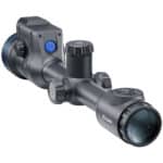 A rifle scope with an electronic sight attached to it.