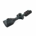 A black scope with a red dot on it.