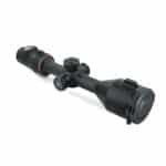 A rifle scope with a black background