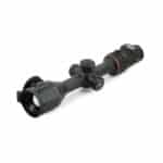 A rifle scope with a red dot sight on it.