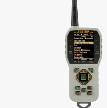 A white and black radio with a green and yellow design.