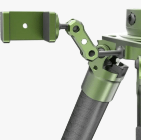 A green and black tripod with a phone attached to it.