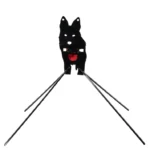 A black dog is standing on two legs.